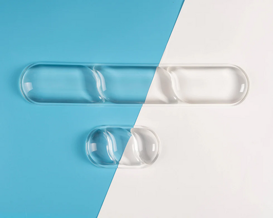 Top view of clear EPOMAKER CloudGel keyboard and mouse wrist rests on blue and white
