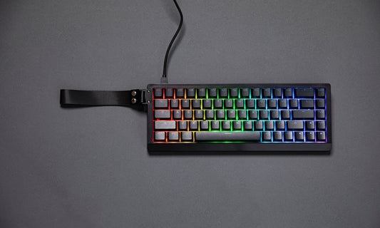 Black EPOMAKER HE68 Lite 65% Hall Effect gaming keyboard with RGB lighting and integrated carry strap