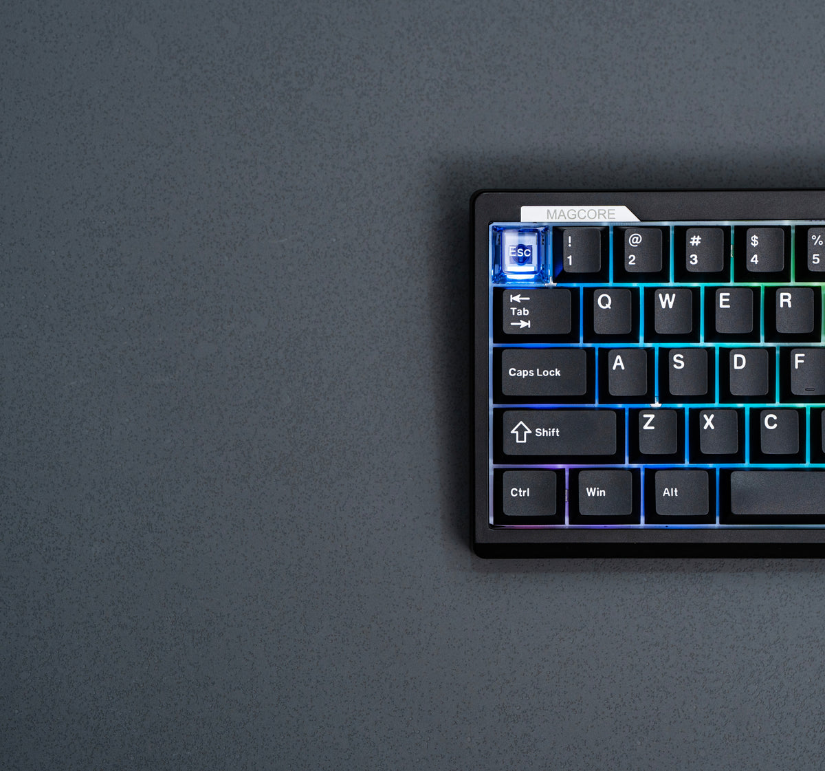 Close-up of the black EPOMAKER Magcore65 Lite 65% inductive analogue gaming keyboard with RGB-lit left keys