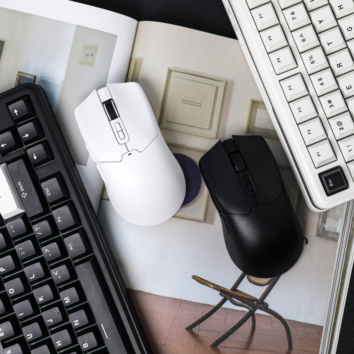 White and Black EPOMAKER Click wireless gaming mice in a top view